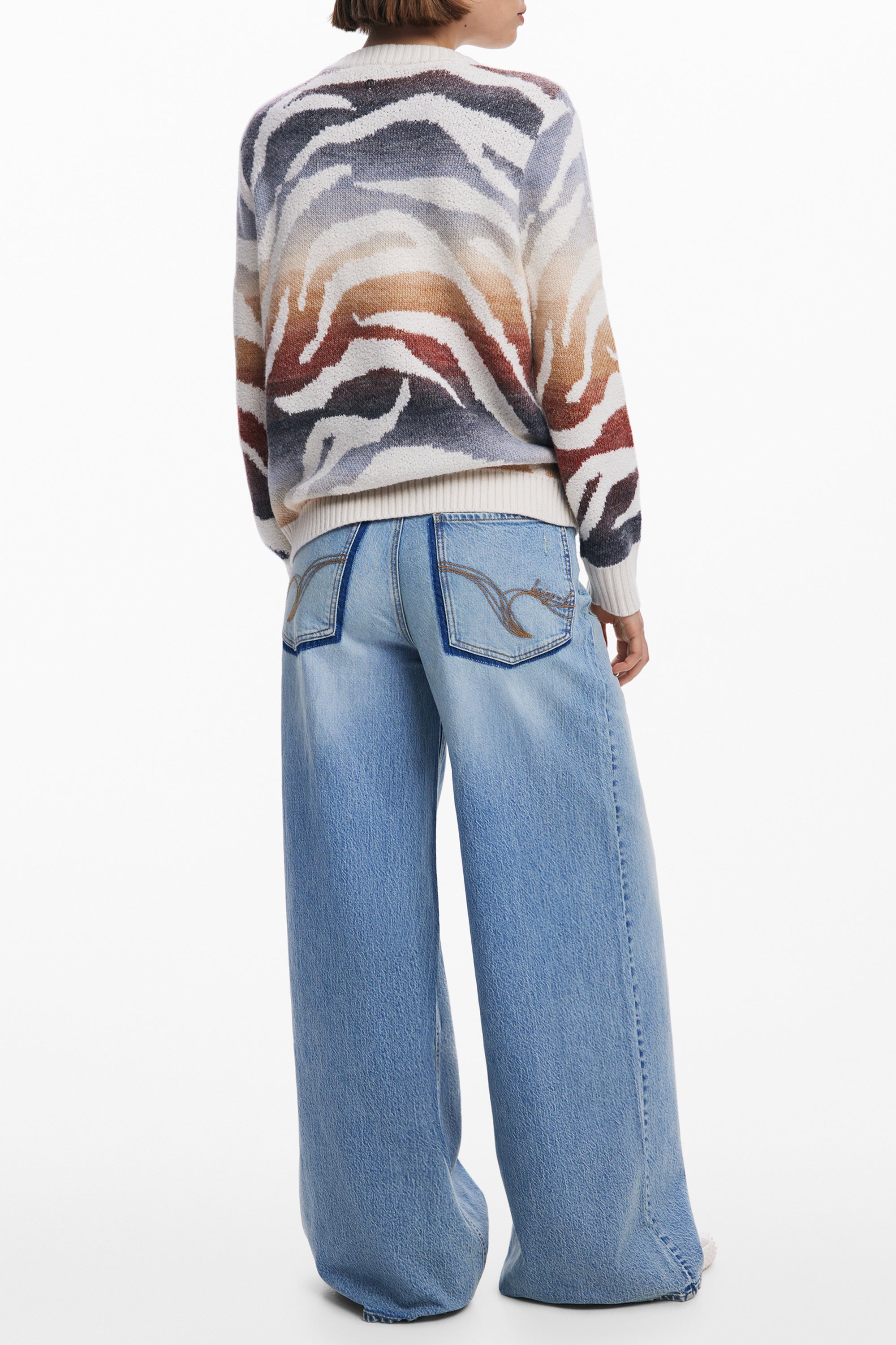 SUÉTER BLANCO DE MUJER DESIGUAL 