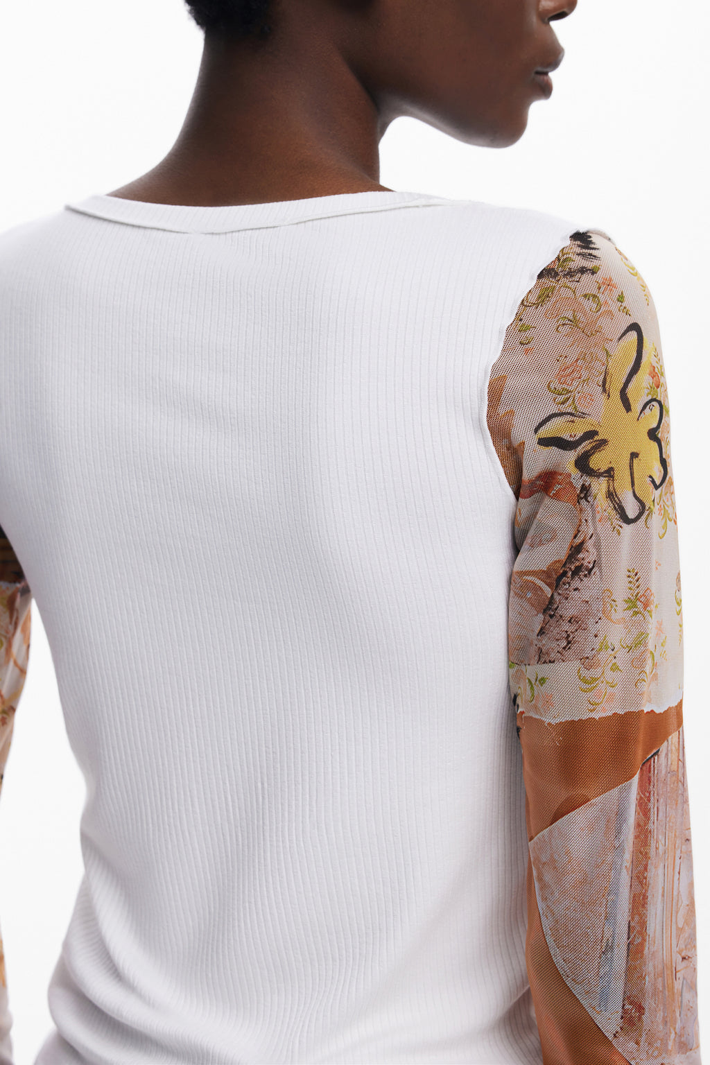 SUÉTER BLANCO DE MUJER DESIGUAL 