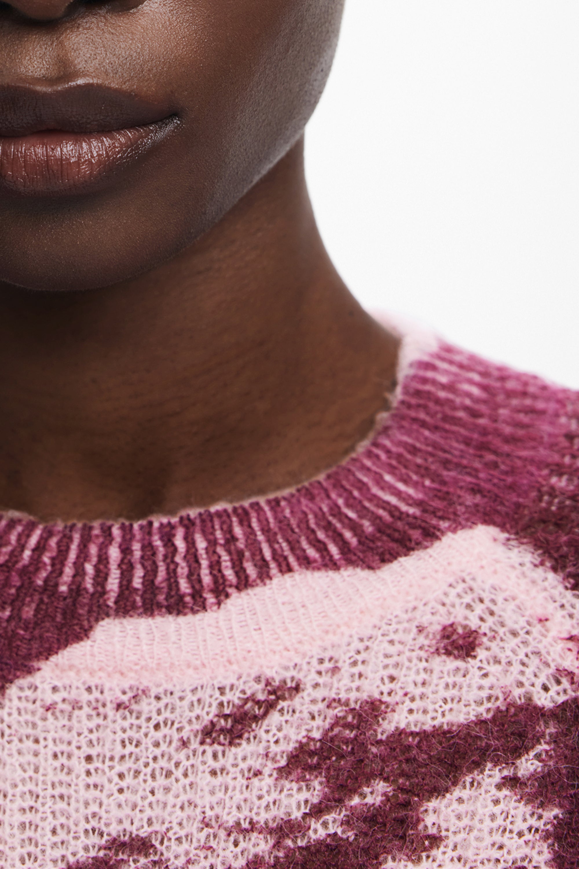 SUÉTER ROSA DE MUJER DESIGUAL 